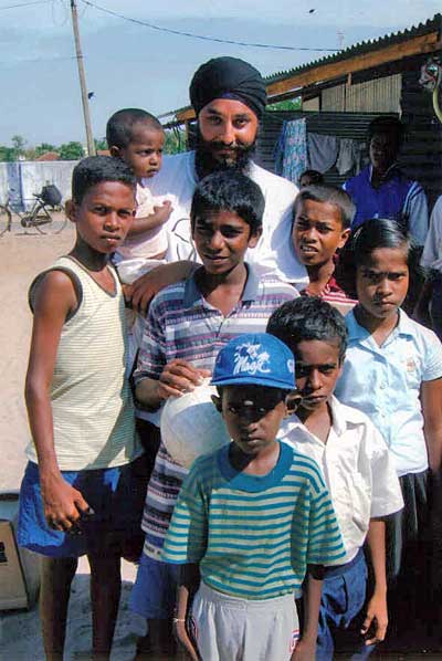 Harvinder Singh with Navalady kids