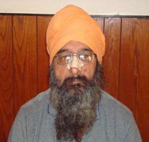 Mr Gurjit Singh attacked by three youths yards from his home.