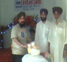 Kirpal Singh from Kuram Agency receiving Aid